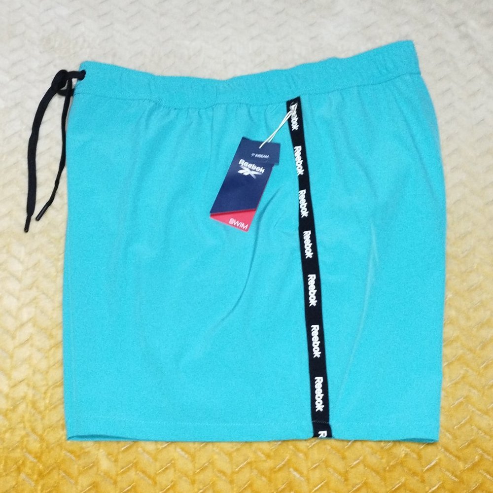 Men's Reebok Mesh Lined Swim Trunks Size  XXL/XXG/TTG. Teal. Retail $48.00. NWT.